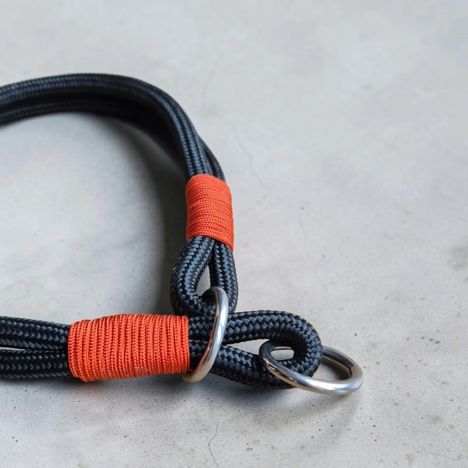 Black rope lead with orange whipping detail