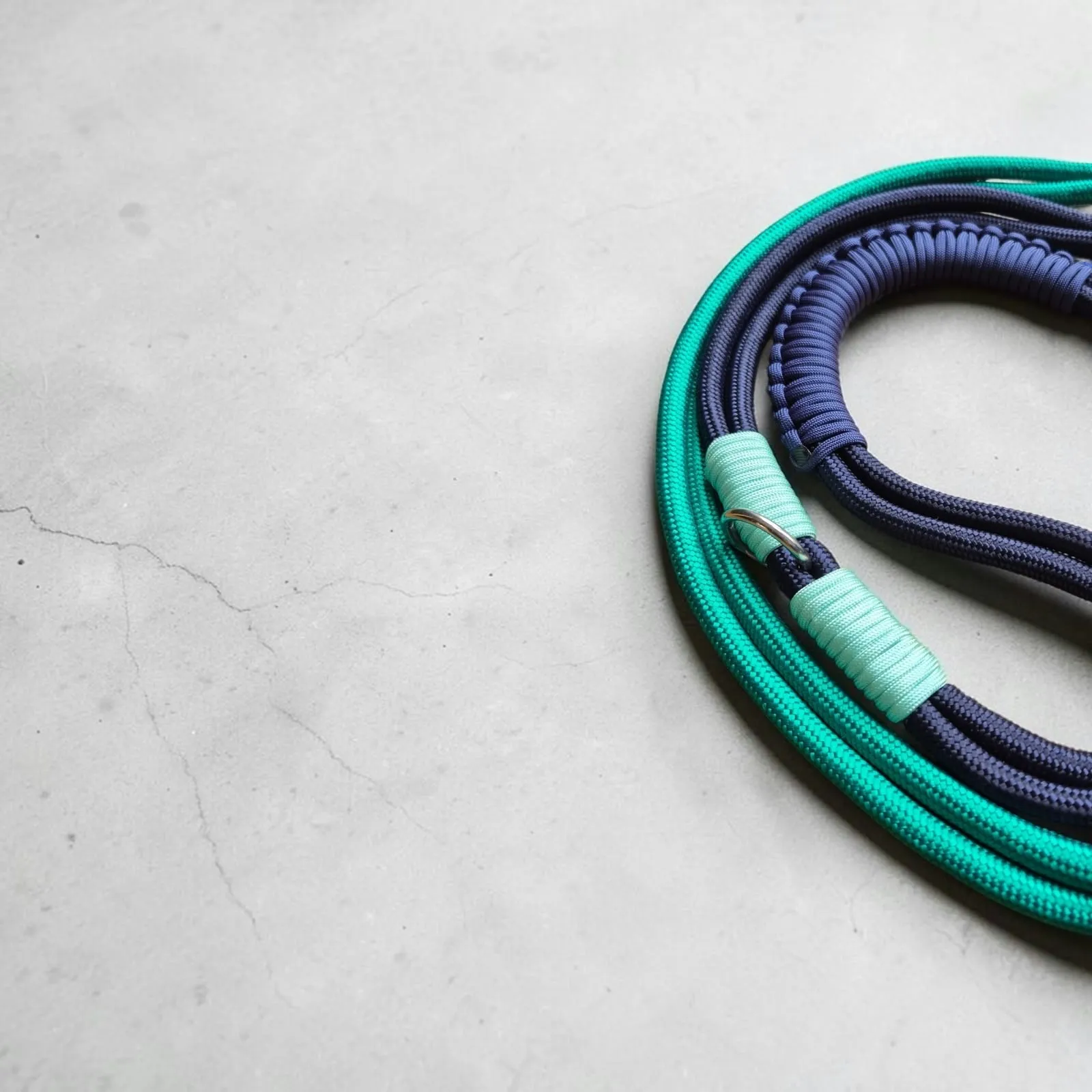 Close-up of navy and bright green rope