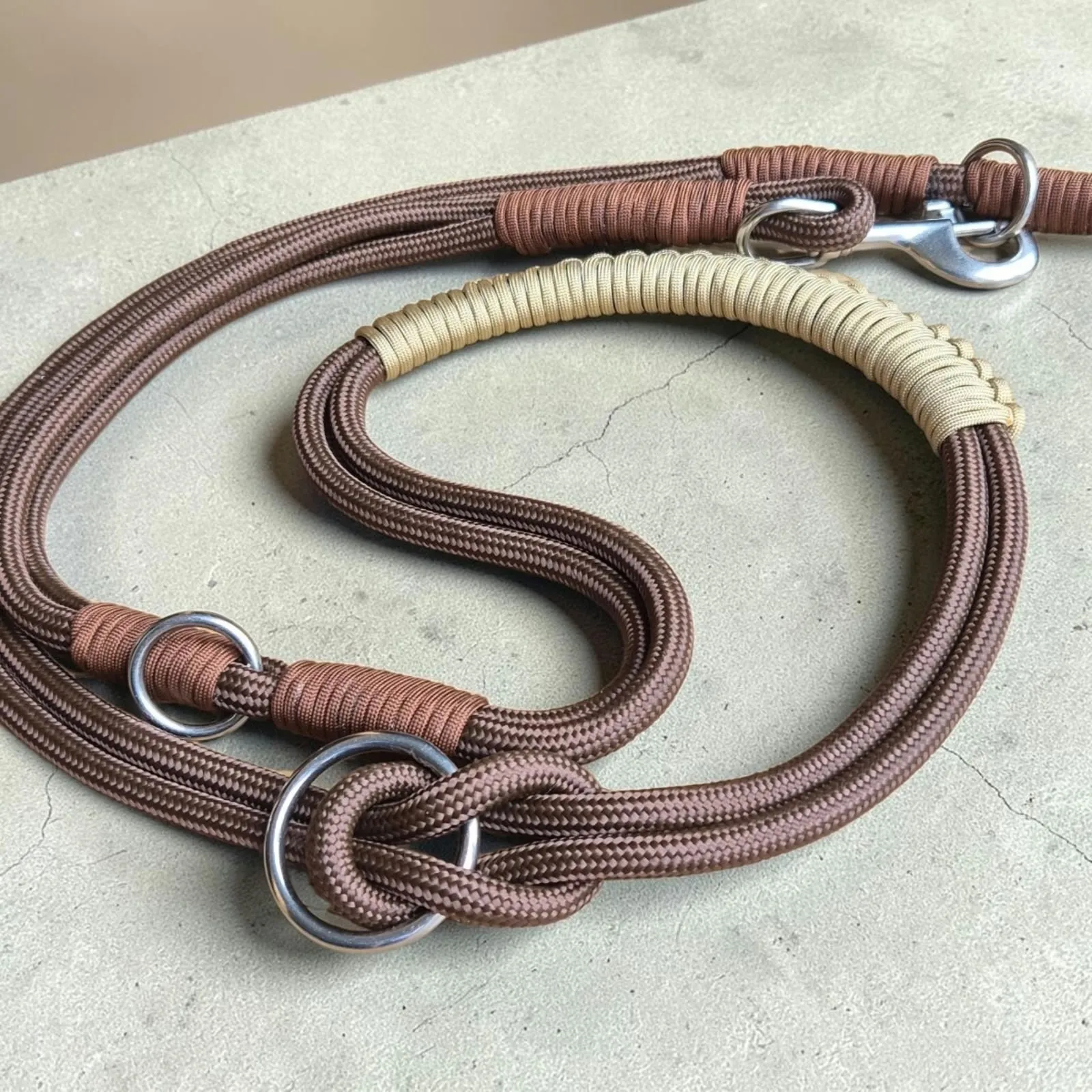 Brown rope lead and matching slip collar with sand-coloured braided handle
